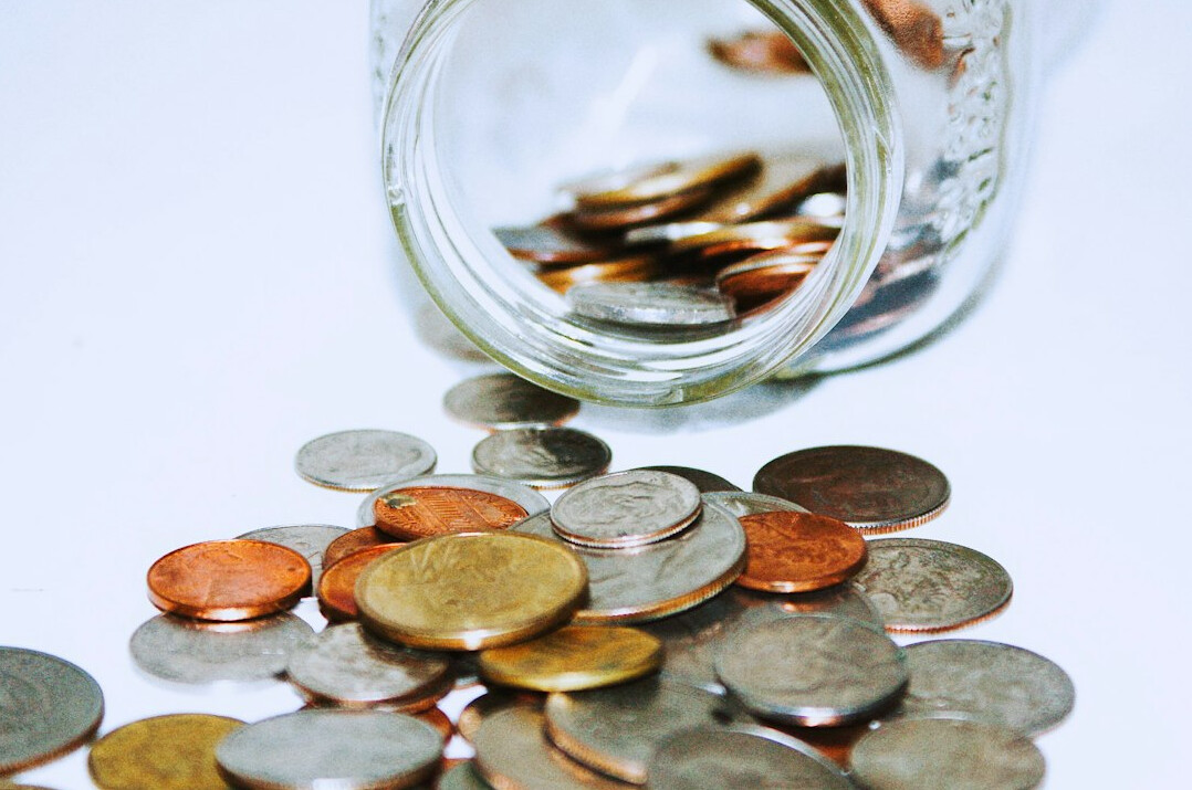 savings jar with coins