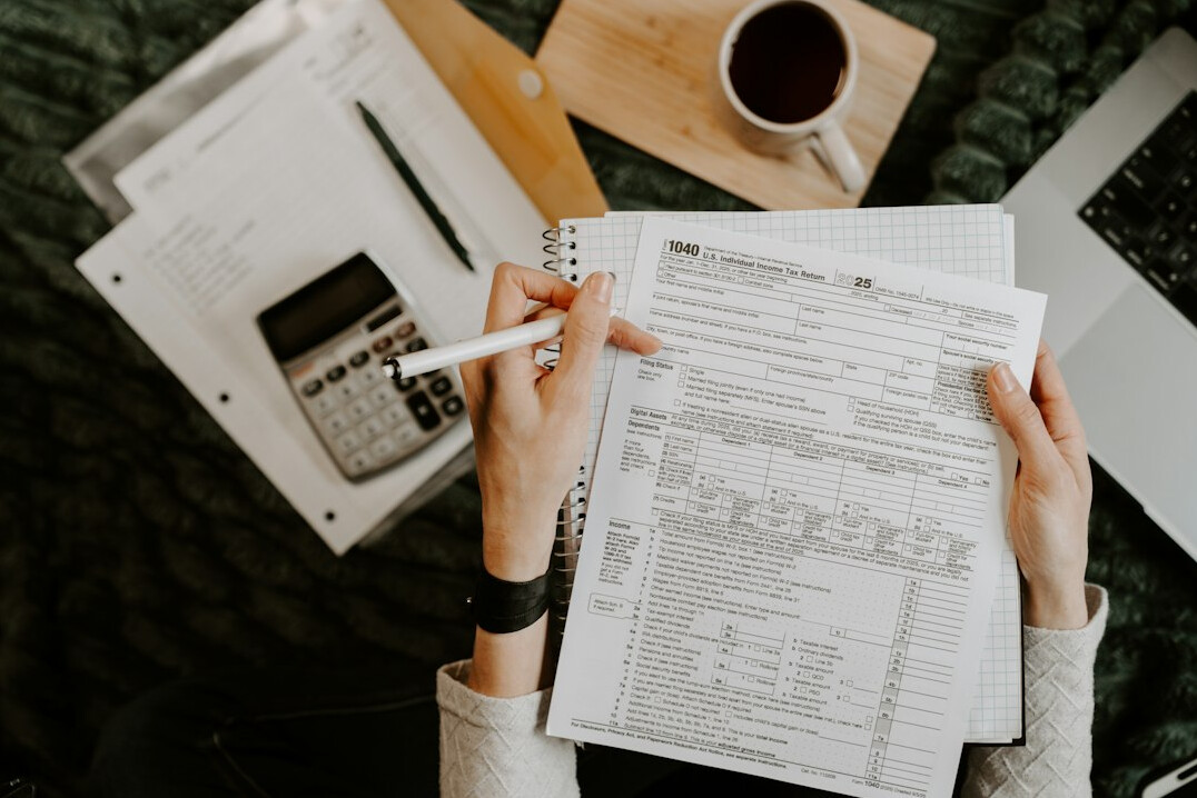 person reviewing budget papers