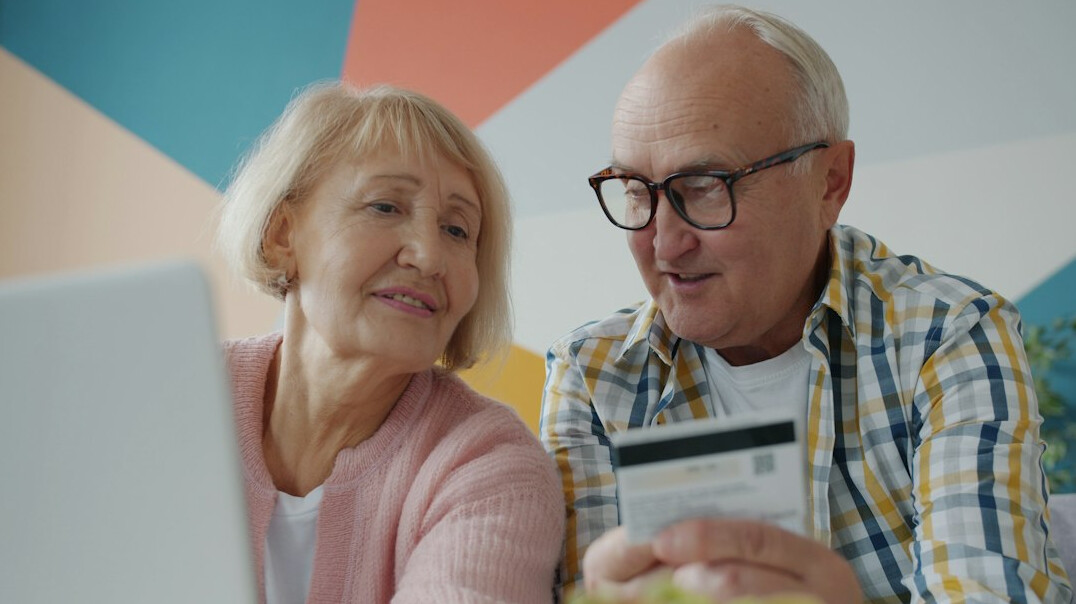 couple reviewing bank statements