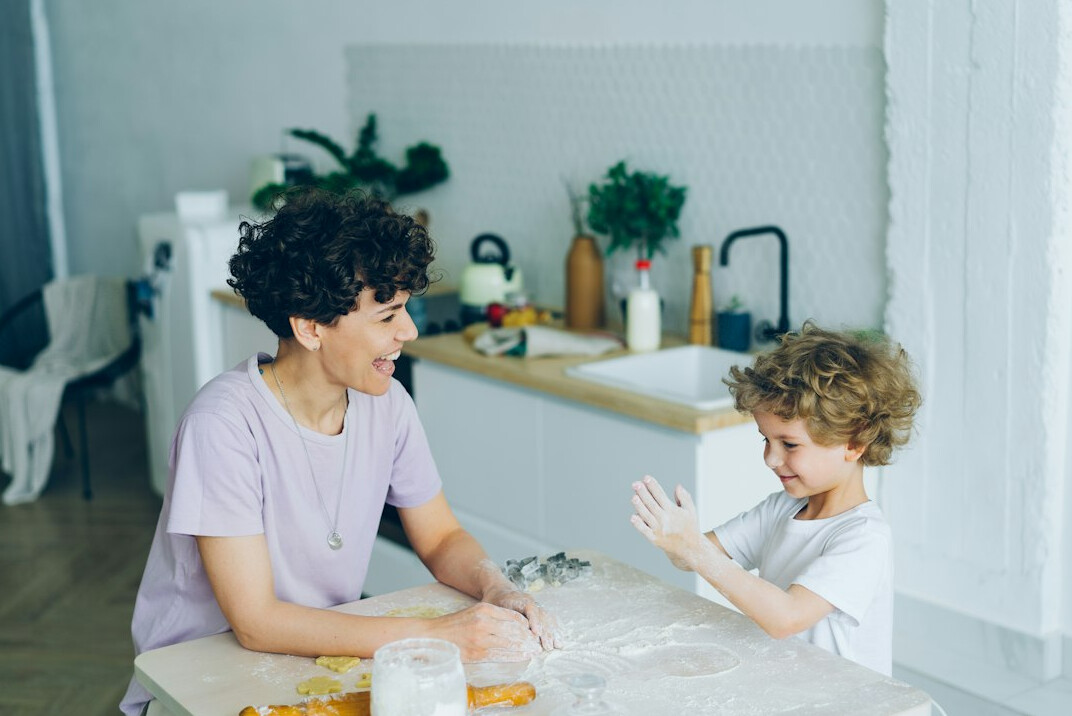 family creating budget at kitchen table